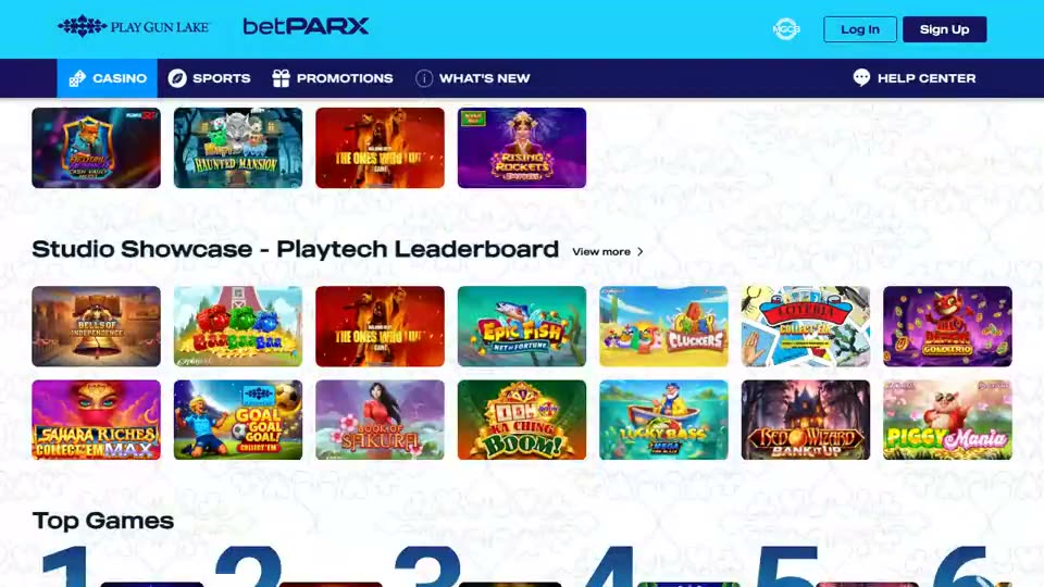 Play Gun Lake’s public casino lobby, branded Play Gun Lake and betPARX: rows of slot and table games and a row headed Studio Showcase - Playtech Leaderboard. The games a player sees come from supplier licensees named in the operator’s terms, not from the operator itself.